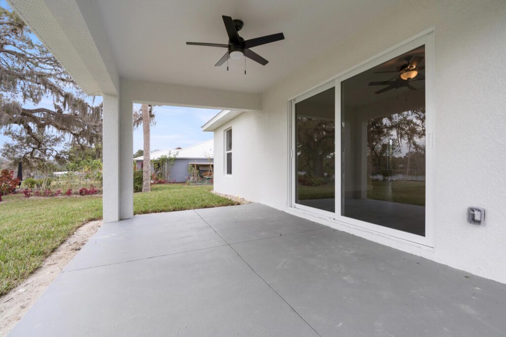 Covered lanai ceiling and surrounding structure being evaluated for outdoor kitchen planning