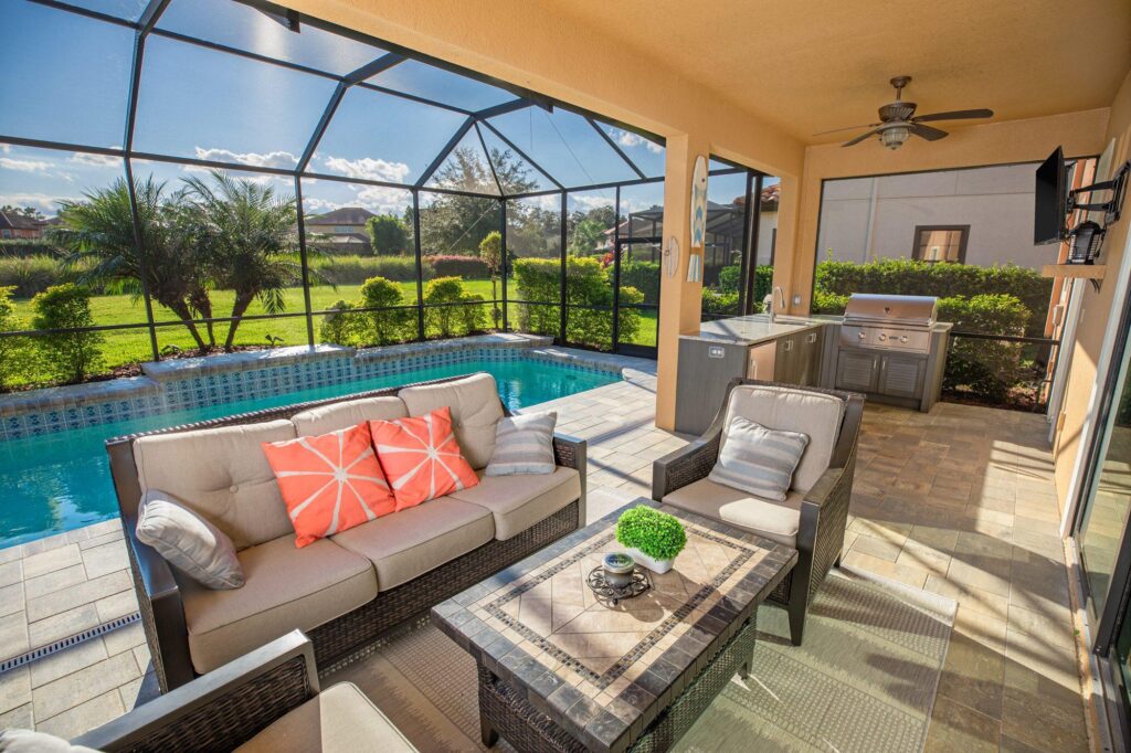 Outdoor kitchen cabinetry on a Florida patio exposed to sunlight and changing weather conditions
